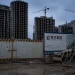 Evergrande, sancționat cu 15,82 miliarde de yuani pentru nereguli financiare