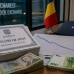 România în pericol de a pierde ratingul de investiții după blocarea salariilor